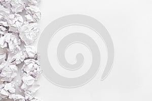 Wasted ideas crumpled paper ball white background