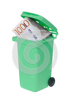 Wasted money in a recyle bin