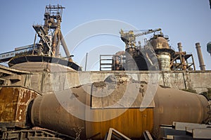 Wasted steel factory with ruin blast furnace photo