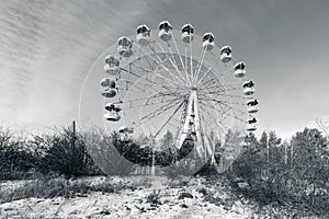 Wasteland with abandoned Ferris wheel