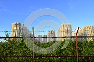 a wasteland in the distance the city, kwun tong