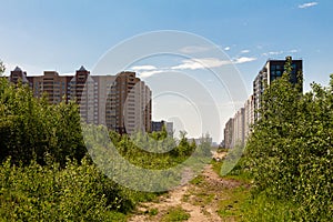 Wasteland and new residential apartment buildings