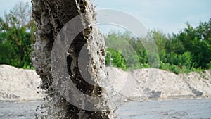 Wastewater from Large Rust Pipe Merge into Environment Forest. Sewage from Sewer Pollutes Terrain. Environmental Pollution
