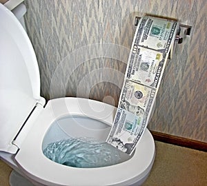 Money in a toilet bowl photo