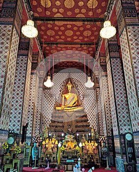 Wat arun bangkok thailand gold buddha and wall paint