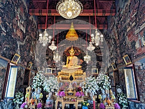 Wat arun bangkok thailand gold buddha and wall paint