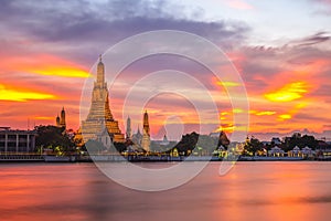 Wat Arun by Chao Phraya River at Bangkok, thailand photo
