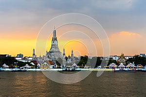 Wat Arun with Chao Phraya river at sunset in Bangkok, Thailand