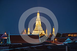 Wat arun with  roof top of the building in the night time.