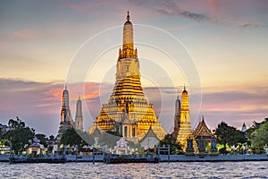 Wat Arun at sunset,along the Chao Phraya river,Bangkok,Thailand