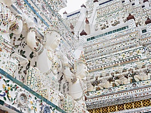 Wat Arun temple Colourful Mosaic tiles Angel figure Landmark Architecture Bangkok Thailand