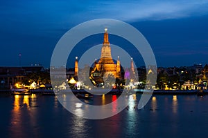 Wat Arun or Temple of Dawn with blue sky.