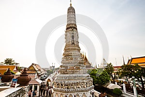 Wat Arun Temple at sunset in Bangkok Thailand. Wat Arun is a Buddhist temple in Bangkok and is one of the most famous landmarks in