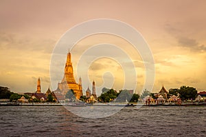 Wat Arun temple at sunset time in on Chao Phraya River Bangkok, Thailand.