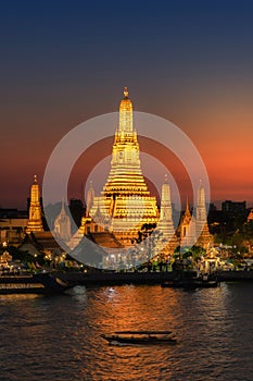 Wat Arun Temple or `Temple of Dawn`  at sunset in Bangkok Thailand and one of Bangkok`s most famous landmarks