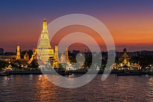 Wat Arun Temple or `Temple of Dawn` at sunset in Bangkok Thailand and one o f Bangkok`s most famous landmarks