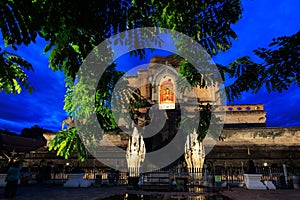 Wat chedi Luang historic temple illuminated at dusk