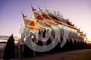 Wat Huay pla kang light up at dusk, Chiang Rai