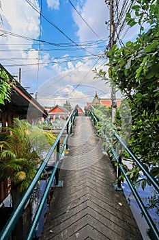 Wat Mondop,Taling Chan,Bangkok,Thailand on November19,2021:The bridge across Khlong Bang Ramat,a canal in Thonburi side of Bangkok