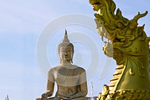 Wat Phikul Thong has a beautiful big Buddha statue in Singburi Province in Thailand