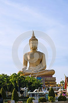 Wat Phikul Thong has a beautiful big Buddha statue in Singburi Province in Thailand