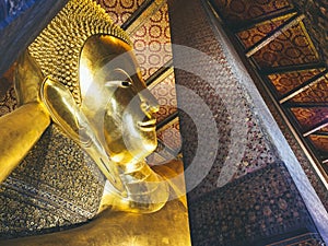 Wat Pho Sleeping buddha gold statue Bangkok Landmark Thailand tourism
