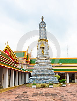 Wat Pho temple in Bangkok city, Thailand. View of pagoda and stupa in famous ancient temple. Religious buildings in buddhism style