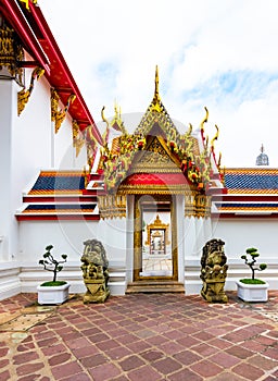 Wat Pho temple in Bangkok city, Thailand. View of pagoda and stupa in famous ancient temple. Religious buildings in buddhism style