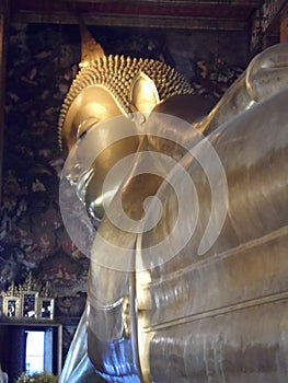 Wat Pho Thai Massage School Service Center. Another attraction of Wat Pho. Chinese stone statues adorned by arches and places.