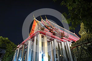 Wat Phra Chetupon Vimolmangklararm at night, Bangkok, Thailand.