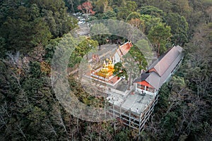Wat Phra That Doi Tung from above birdeyes view, a famous Temple and Buddhism place. It`s settled on the mountain in Chiang Rai