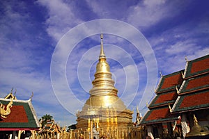 Wat Phra That Hariphunchai an iconic Buddhist pagoda in Lamphun province, Thailand. Its Lanna style chedi enshrines a relic of the