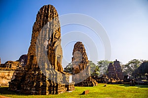 Wat Phra Mahathat temple with head statue trapped in bodhi tree in Phra Nakhon Si Ayutthaya, Thailand