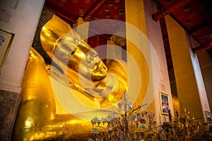 Wat Phra Non Chak Si Worawihan or Wat Phra Non Chakkrasi Worawihan, big reclined Buddha, in Sing buri, Thailand