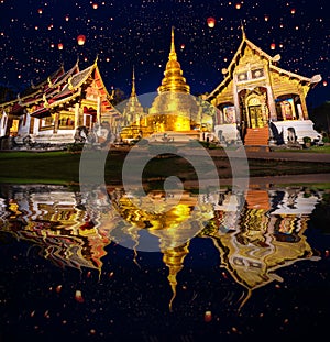 wat phra singh temple in night time in raining season in Chiang mai city