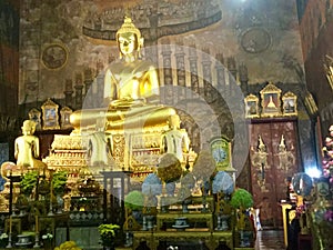 Bronze Buddha in Thai Temple, Bangkok photo