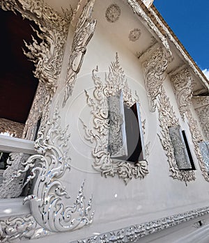 Wat Rong Khun window and terrace close up details of ornamentation