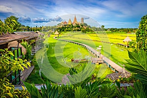 Wat Tham Sua temple is a rice field around in Kanchanaburi, Thailand