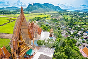 Wat tham sua, thailand temple landscape landmark in kanchanaburi, thailand travel concept background. Wat tham sua or tiger cave photo