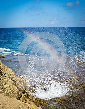 Wataluma blow hole and ranbow - Curacao Views photo