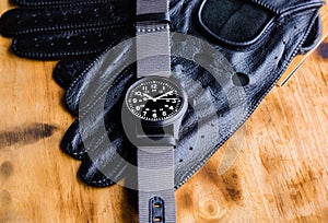 watch with a black and extendable canvas in the same tone along.