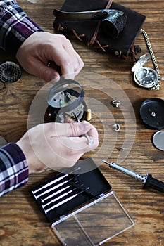 Watch clock repair retro concept working hard in a past