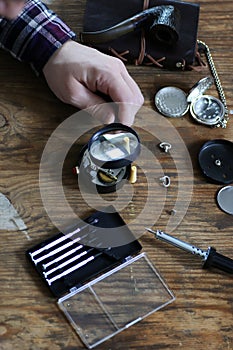 Watch clock repair retro concept working hard in a past