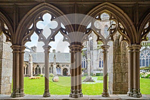 Watch through cloister in CloÃ®tre de la cathÃ©drale, TrÃ©guier