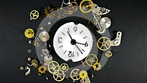 Watch dial and cog wheels rotating