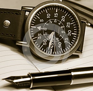 Watch and fountain pen