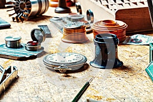 Watch parts scattered, silent narrative of craftsmanship photo