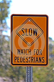 Watch for pedestrians sign