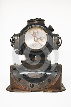 A watch in the shape of an antique diving helmet.