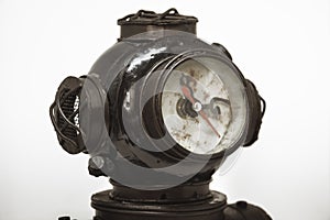 A watch in the shape of an antique diving helmet.